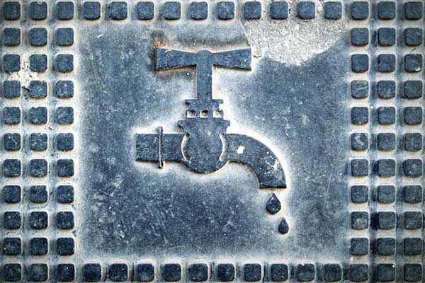 Engraving of a water tap