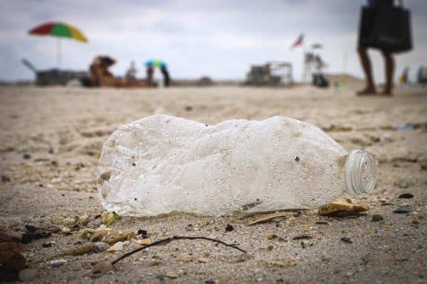Discarded plastic bottle on a beach