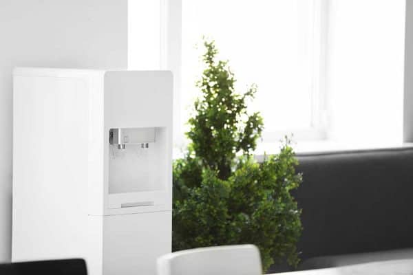 sleek bottleless water cooler in a modern office setting