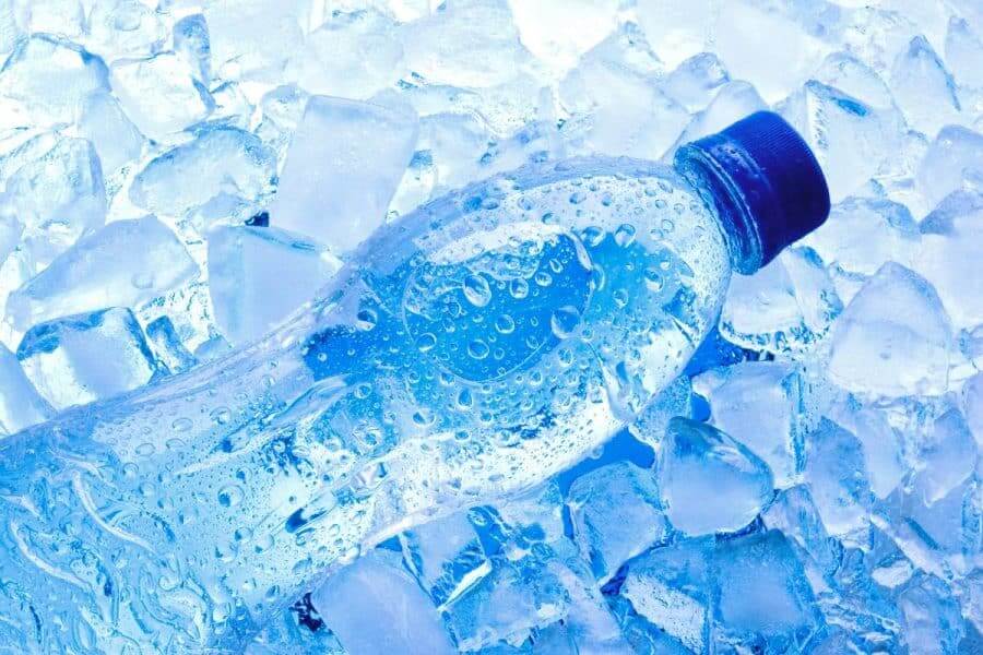 Plastic water bottle on a bed of ice